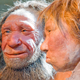 Reconstructions of a Neanderthal man and woman.
